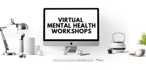 Image of a desk and computer. "Virtual Mental Health Workshops" appear on the computer screen